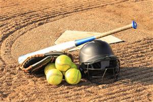 Softball bat and balls